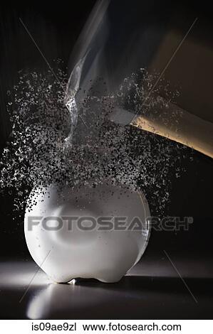 Close up hammer hitting piggy bank with blurred motion View Large Photo Image Stock Image - Close up hammer hitting piggy bank with blurred motion. Fotosearch