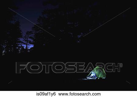 Stock Photograph - Female backpacker camping alone, Mount Charleston, Nevada, USA. Fotosearch