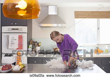 Girl searching for favorite biscuit from biscuit barrel View Large Photo Image Stock Image - Girl searching for favorite biscuit from biscuit barrel. Fotosearch