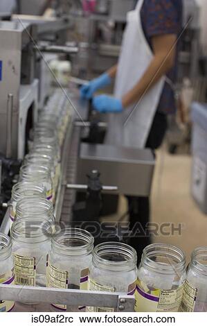 Glass jars on production line View Large Photo Image Stock Image - Glass jars on production line. Fotosearch