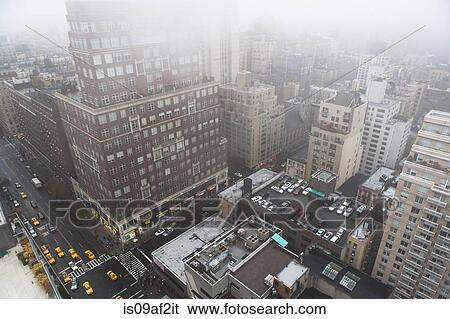 High angled cityscape in mist, New York City, USA View Large Photo Image Stock Photograph - High angled cityscape in mist, New York City, USA. Fotosearch