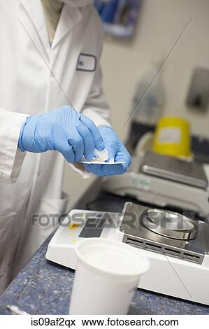 Stock Photo - Man working in food research laboratory. Fotosearch