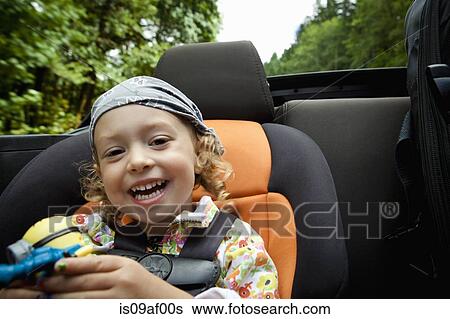 Portrait of female toddler in back seat of open soft top View Large Photo Image Stock Photograph - Portrait of female toddler in back seat of open soft top. Fotosearch