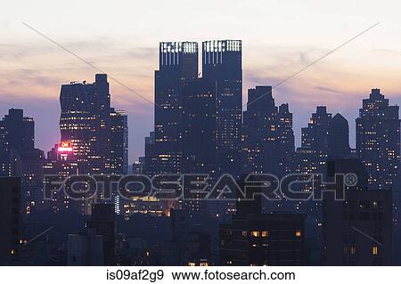 Stock Photo - Silhouetted cityscape, New York City, USA. Fotosearch