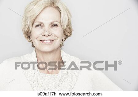 Studio portrait of elegant senior woman View Large Photo Image Stock Image - Studio portrait of elegant senior woman. Fotosearch