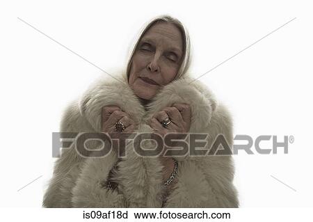 Studio shot of mature woman with eyes closed View Large Photo Image Stock Image - Studio shot of mature woman with eyes closed. Fotosearch