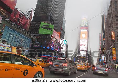 Stock Photograph - Traffic and mist, Times Square, New York City, USA. Fotosearch