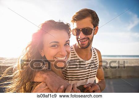 Young couple at San Diego beach View Large Photo Image Stock Photo - Young couple at San Diego beach. Fotosearch
