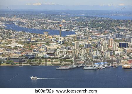 Stock Photograph - Aerial view of Seattle Waterfront, Lake Union and Cascade Mountains, Washington State. Fotosearch