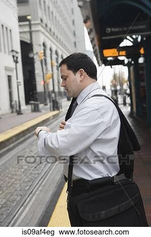 Businessman commuting to work View Large Photo Image Stock Image - Businessman commuting to work. Fotosearch