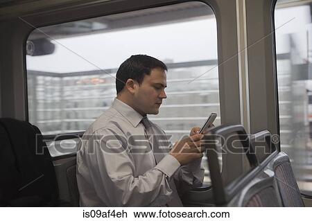 Stock Image - Businessman commuting to work. Fotosearch