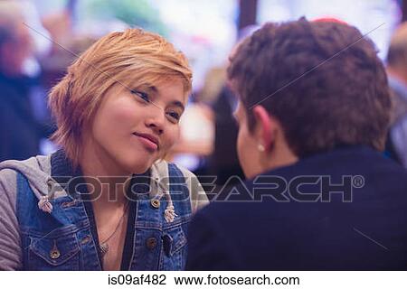 Stock Image - Couple looking at each other. Fotosearch