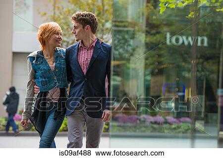 Couple walking, Toronto, Ontario, Canada View Large Photo Image Stock Photo - Couple walking, Toronto, Ontario, Canada. Fotosearch
