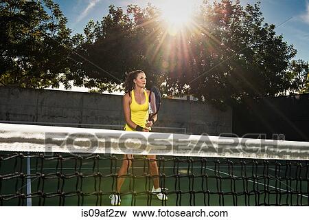 Female tennis player and net View Large Photo Image Stock Photo - Female tennis player and net. Fotosearch