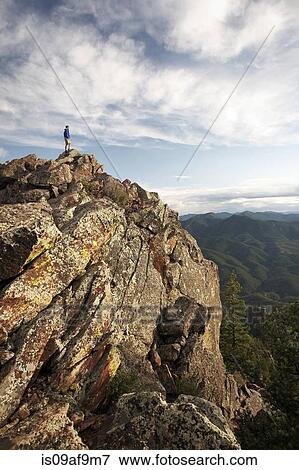 Man standing on rock formation, Boulder, Colorado, USA View Large Photo Image Stock Photo - Man standing on rock formation, Boulder, Colorado, USA. Fotosearch