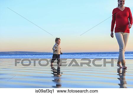 Mother and toddler son having fun on beach, San Diego, California, USA View Large Photo Image Stock Image - Mother and toddler son having fun on beach, San Diego, California, USA. Fotosearch