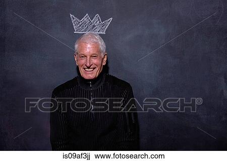 Portrait of senior man in front of chalked crown on blackboard View Large Photo Image Stock Image - Portrait of senior man in front of chalked crown on blackboard. Fotosearch