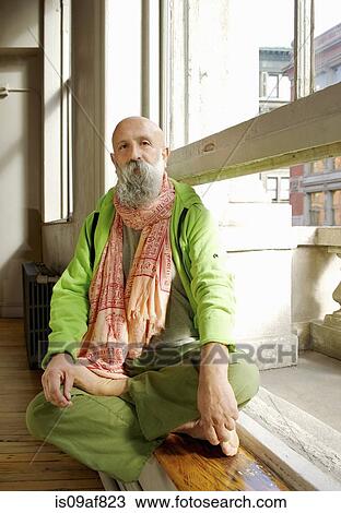 Portrait of senior man wearing scarf on windowsill View Large Photo Image Stock Image - Portrait of senior man wearing scarf on windowsill. Fotosearch