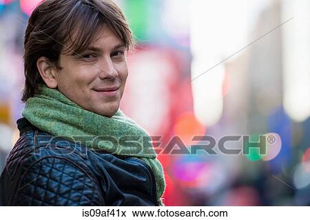 Stock Photo - Portrait of young male tourist, New York City, USA. Fotosearch