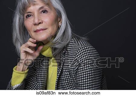 Studio portrait of attractive senior woman View Large Photo Image Picture - Studio portrait of attractive senior woman. Fotosearch