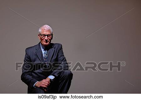 Studio portrait of cool senior man in suit View Large Photo Image Stock Photography - Studio portrait of cool senior man in suit. Fotosearch