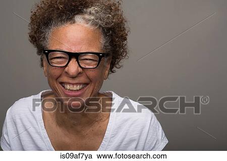 Studio portrait of happy senior woman View Large Photo Image Stock Image - Studio portrait of happy senior woman. Fotosearch