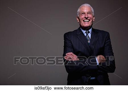 Studio portrait of senior man in suit View Large Photo Image Picture - Studio portrait of senior man in suit. Fotosearch
