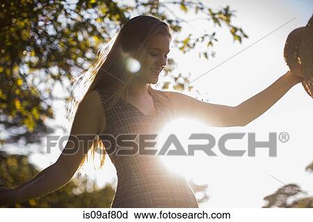 Teenage girl dancing in park View Large Photo Image Stock Image - Teenage girl dancing in park. Fotosearch