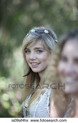Two teenage girls in woodland View Large Photo Image Stock Photo - Two teenage girls in woodland. Fotosearch