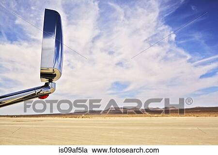 View of car wing mirror and arid landscape View Large Photo Image Stock Image - View of car wing mirror and arid landscape. Fotosearch