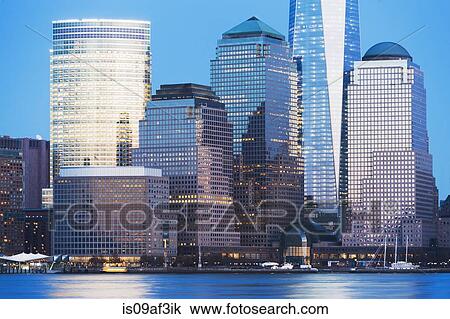 View of river and New York skyline at dusk View Large Photo Image Stock Image - View of river and New York skyline at dusk. Fotosearch