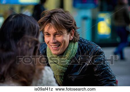 Stock Photo - Young couple at sidewalk cafe, New York City, USA. Fotosearch