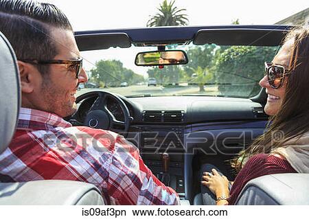 Young couple in convertible, San Diego, California, USA View Large Photo Image Picture - Young couple in convertible, San Diego, California, USA. Fotosearch