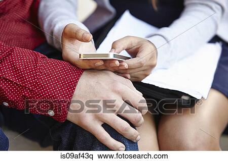 Young couple spending time together View Large Photo Image Stock Photography - Young couple spending time together. Fotosearch