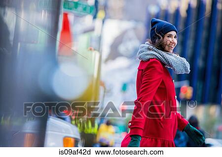 Stock Image - Young female tourist, New York City, USA. Fotosearch