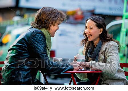 Young tourist couple at sidewalk cafe, New York City, USA View Large Photo Image Stock Photo - Young tourist couple at sidewalk cafe, New York City, USA. Fotosearch