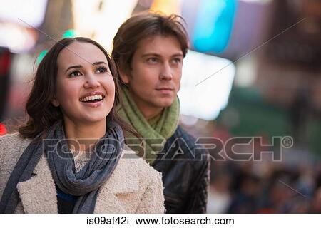 Stock Image - Young tourist couple, New York City, USA. Fotosearch