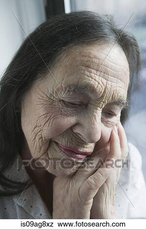 Stock Photo - Portrait of senior woman, close up. Fotosearch