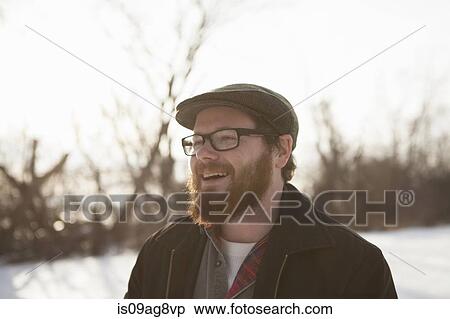 Portrait of young man in winter sunlight View Large Photo Image Stock Photography - Portrait of young man in winter sunlight. Fotosearch