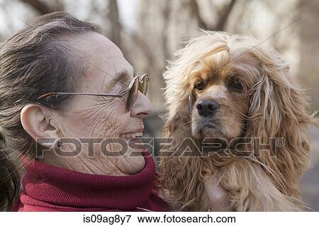 Senior woman with dog View Large Photo Image Stock Photo - Senior woman with dog. Fotosearch