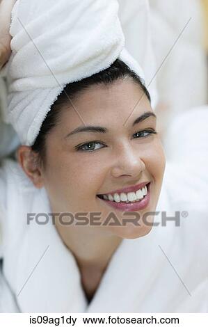 Young woman in bathrobe and turban View Large Photo Image Stock Photo - Young woman in bathrobe and turban. Fotosearch