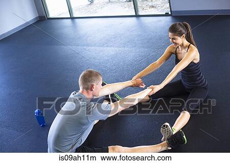 Picture - Couple stretching. Fotosearch
