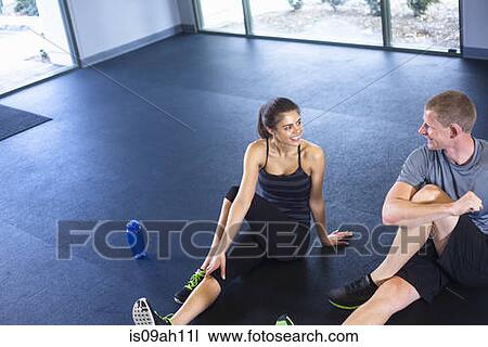 Couple stretching View Large Photo Image Stock Image - Couple stretching. Fotosearch