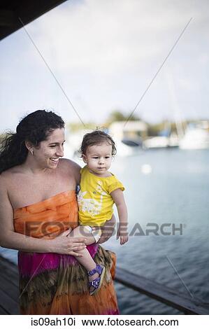 Mother and daughter by seaside View Large Photo Image Stock Image - Mother and daughter by seaside. Fotosearch