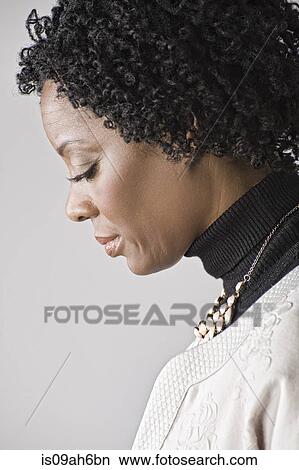 Portrait of mature woman, side view View Large Photo Image Picture - Portrait of mature woman, side view. Fotosearch