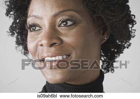 Stock Image - Portrait of mature woman. Fotosearch