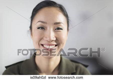 Portrait of mid adult woman smiling View Large Photo Image Stock Image - Portrait of mid adult woman smiling. Fotosearch