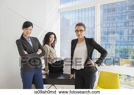 Portrait of three confident businesswomen View Large Photo Image Stock Image - Portrait of three confident businesswomen. Fotosearch