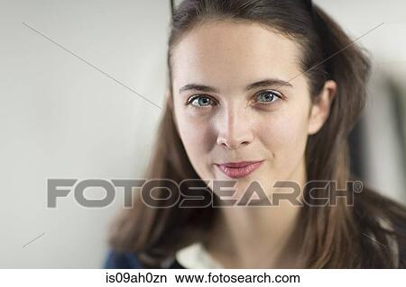 Picture - Portrait of young woman smiling. Fotosearch