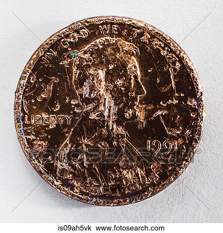 Stock Image - Still life of a scratched one cent coin. Fotosearch